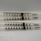 Illustration for article titled Covid-19 Booster Shots Likely Needed Within a Year, Top Biden Advisor Says